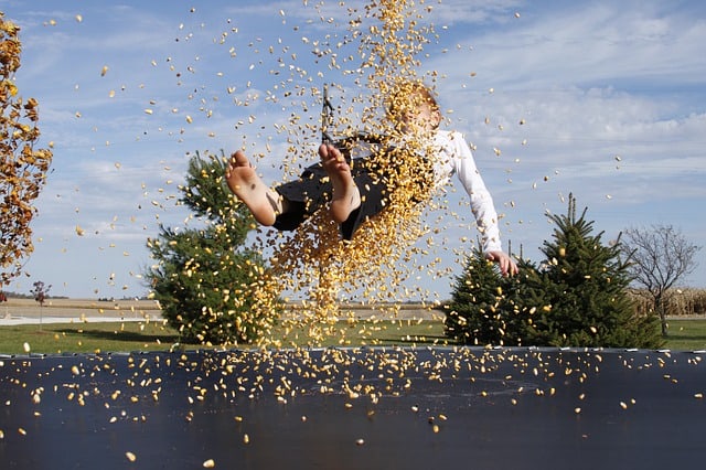 enjoying on in-ground trampoline